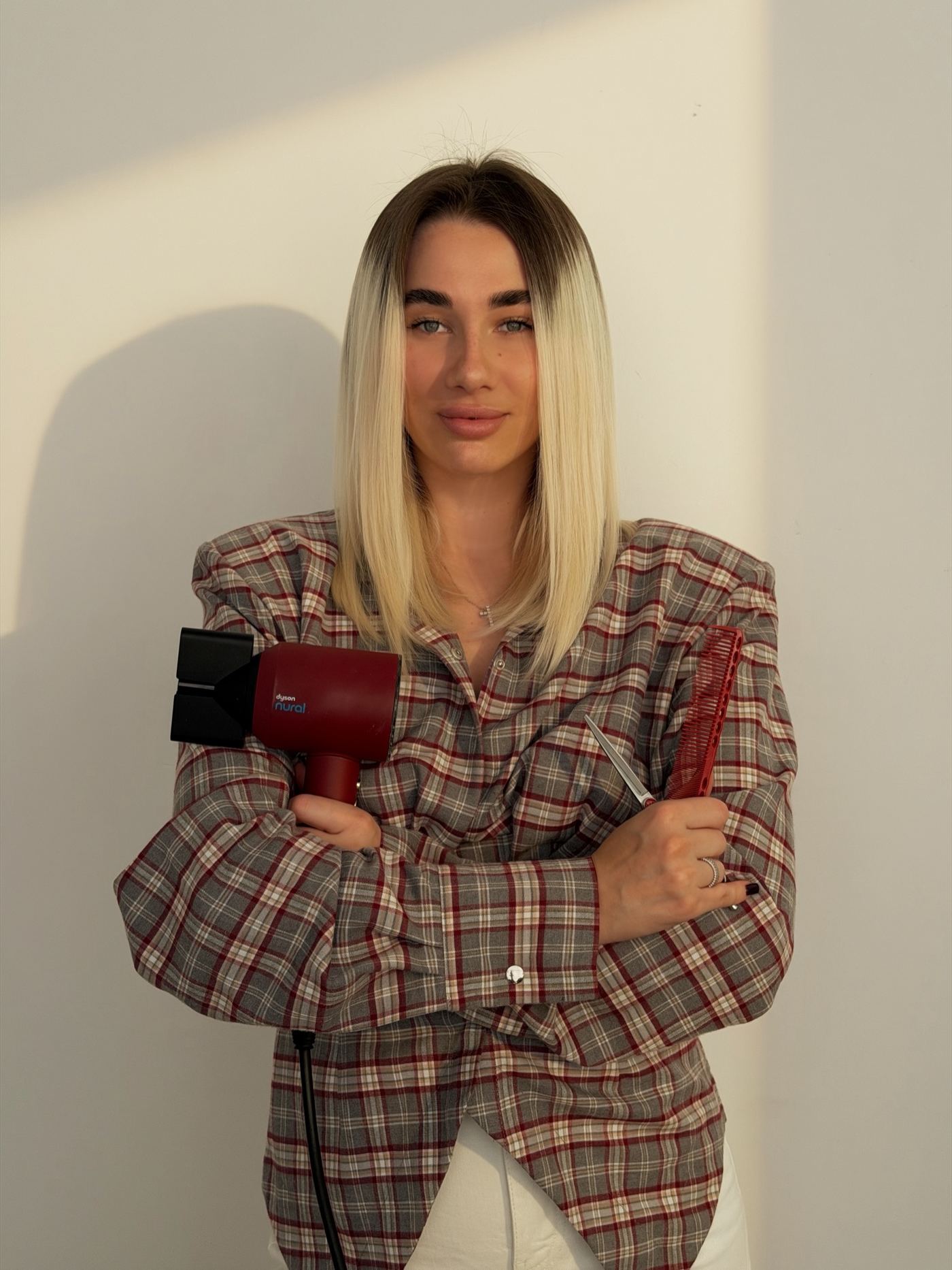 Anastasiia Tupalo, hair stylist and owner of Boom Beauty Time Hair Studio