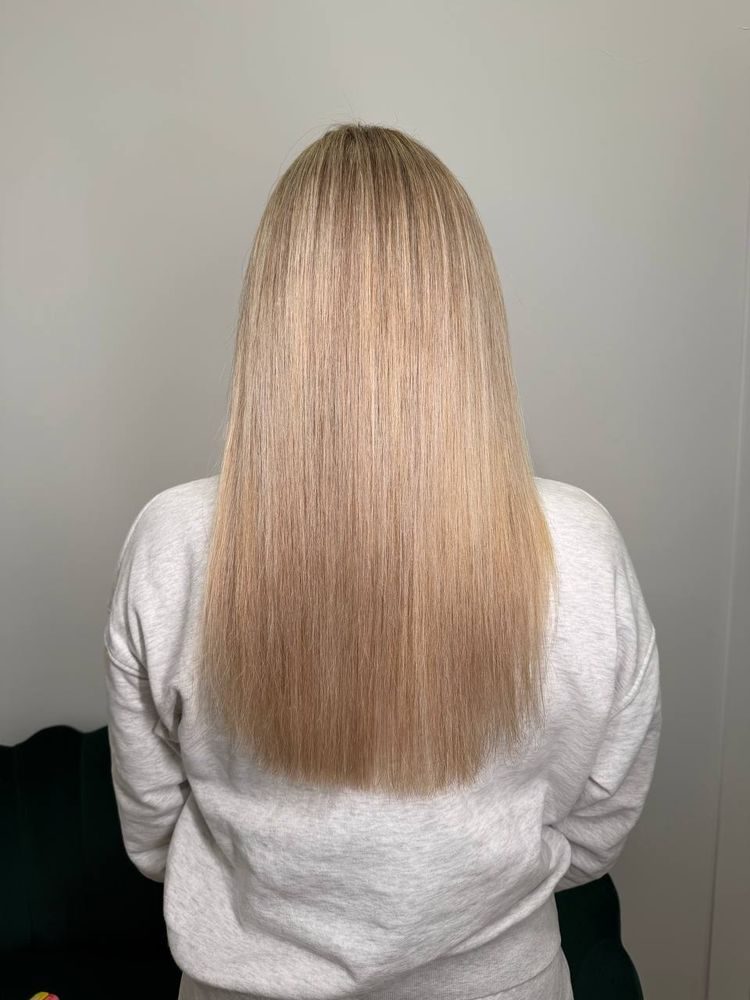Smooth straight blonde hair after treatment